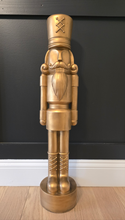 Load image into Gallery viewer, Large Gold Nutcracker Statue
